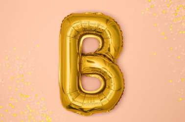 1 Petit ballon lettre doré - 35 cm